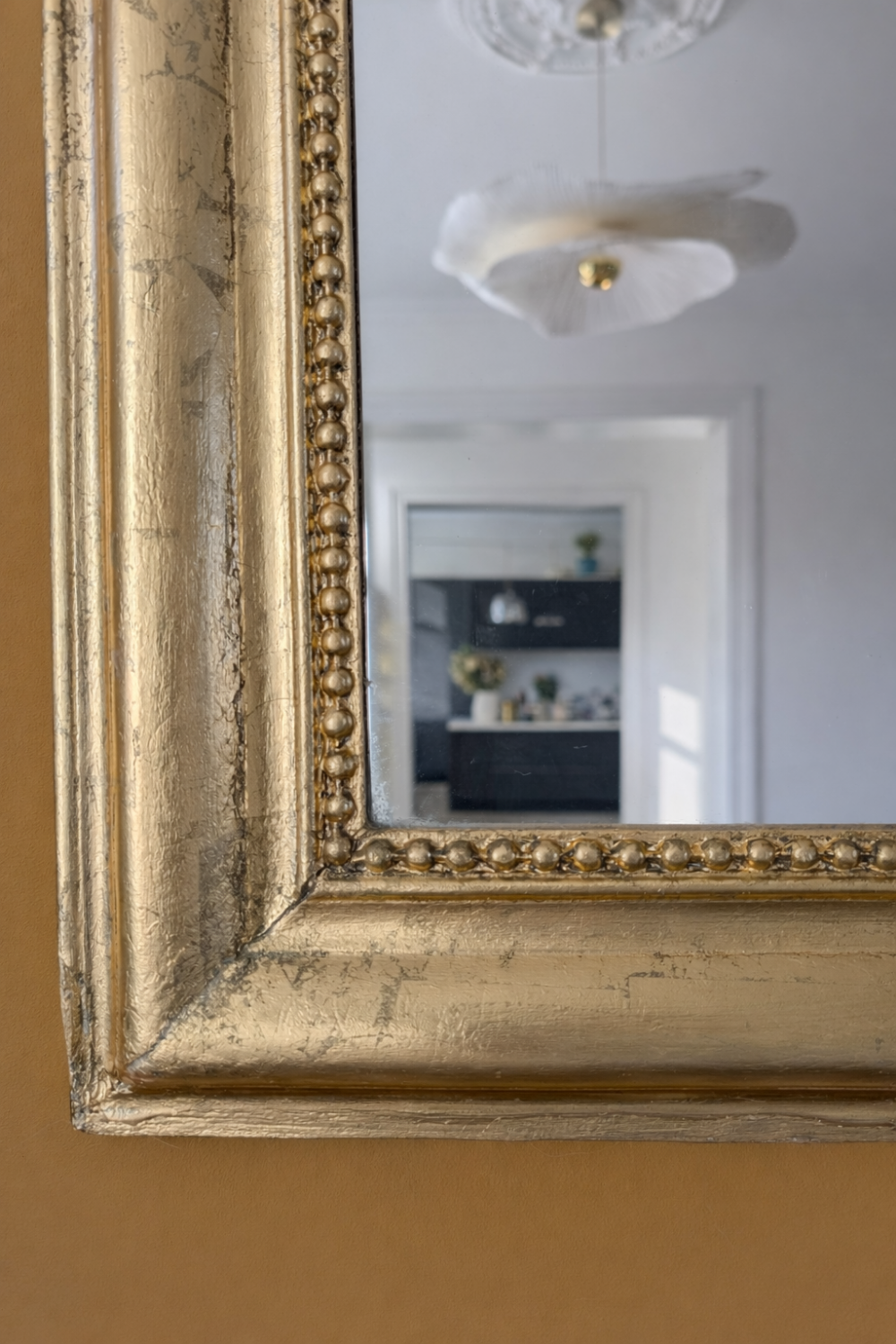 Large antique gilded mirror.