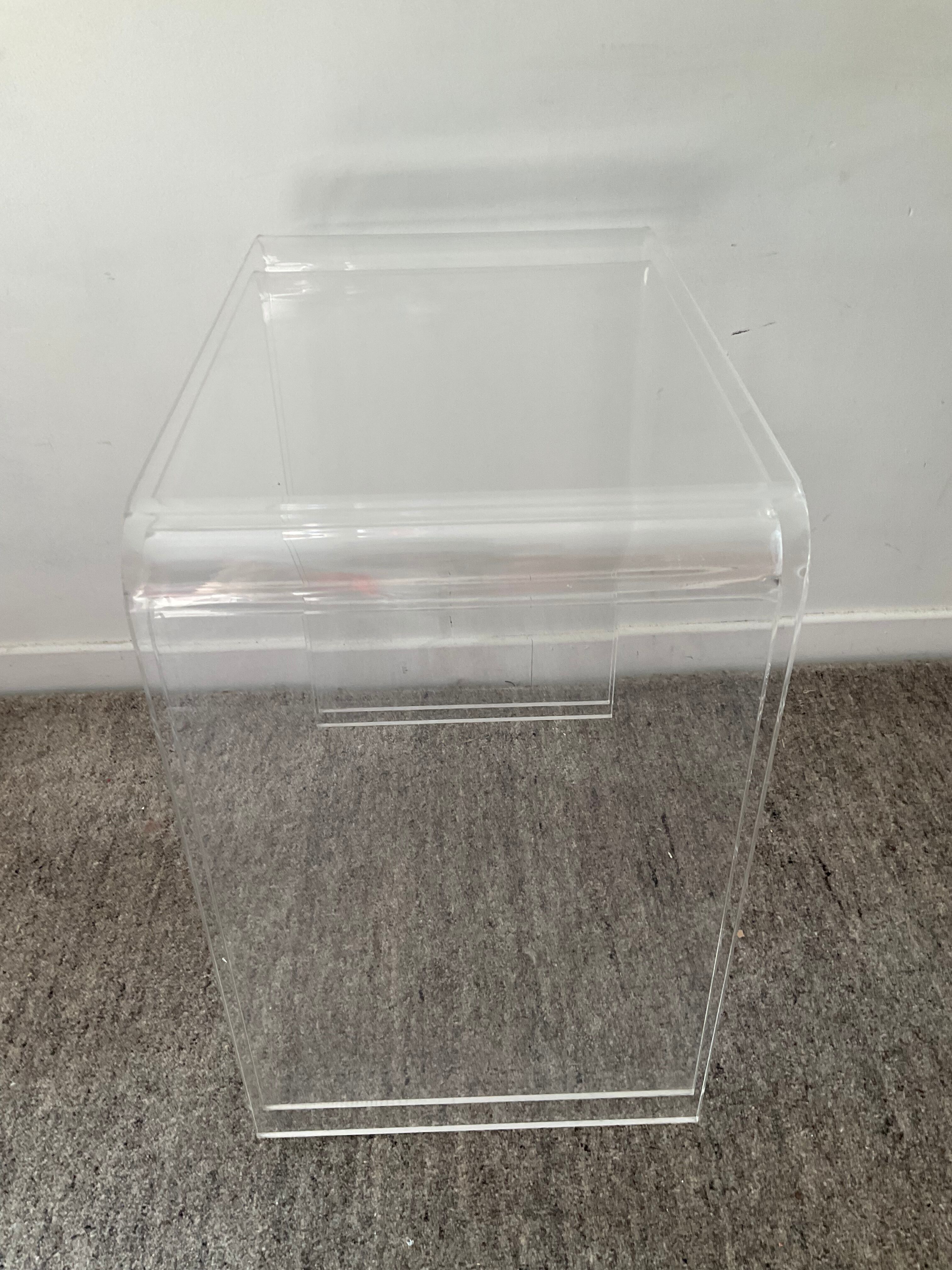 Duo of pull-out tables in plexiglass 70s