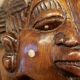 Old large African wall mask in carved wood