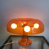 Orange nessino pose lamp for artemide by giancarlo mattioli