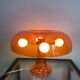 Orange nessino pose lamp for artemide by giancarlo mattioli