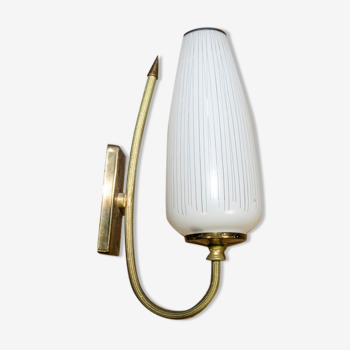 Ornate wall lamp made of milk glass and brass