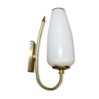 Ornate wall lamp made of milk glass and brass