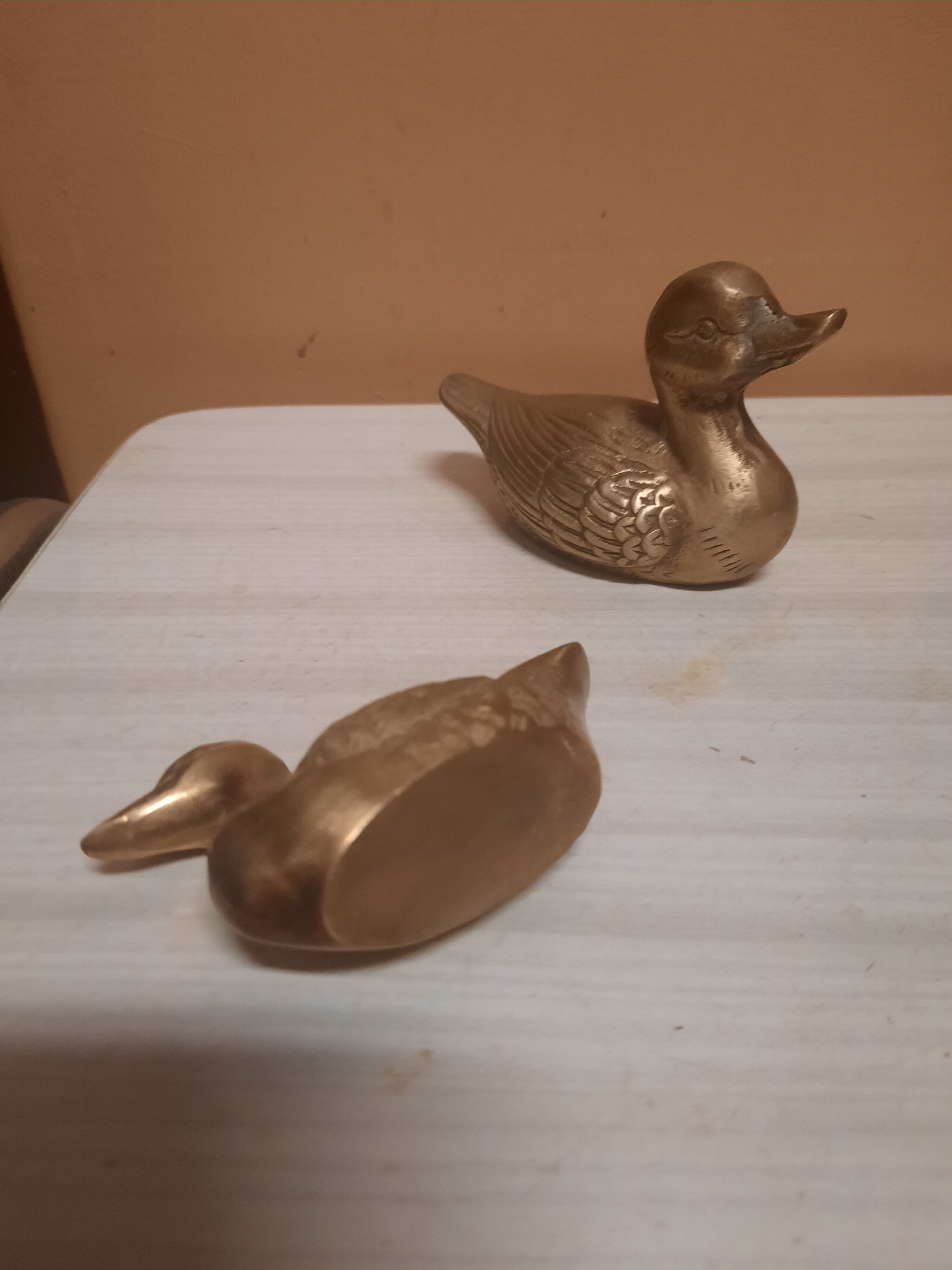 Set of two brass ducks