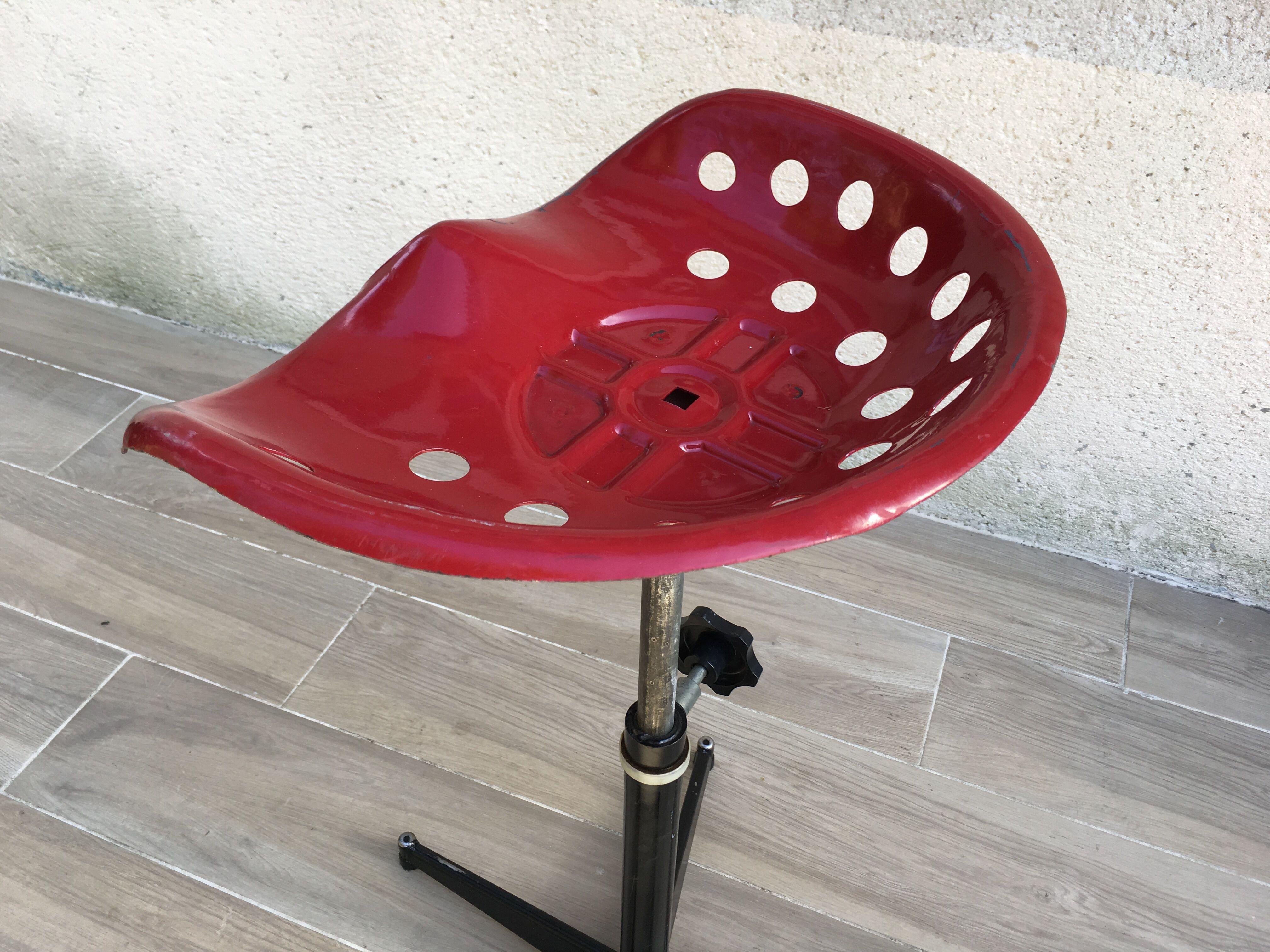 Vintage high stool sitting tractor