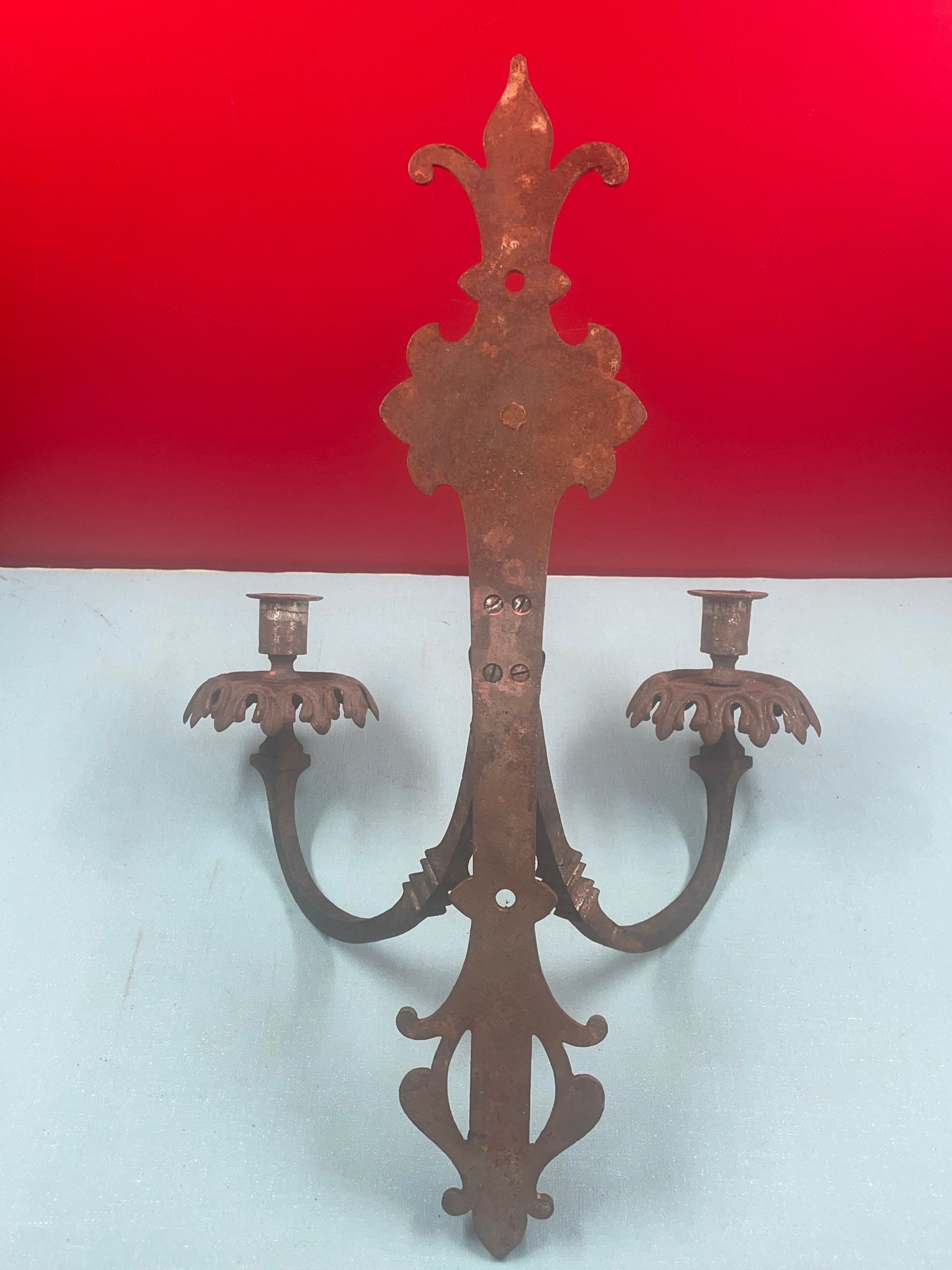 Large pair of non-electrified medieval style candle sconces rusty iron