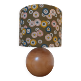 round wooden lamp, khaki lampshade with rising sun print