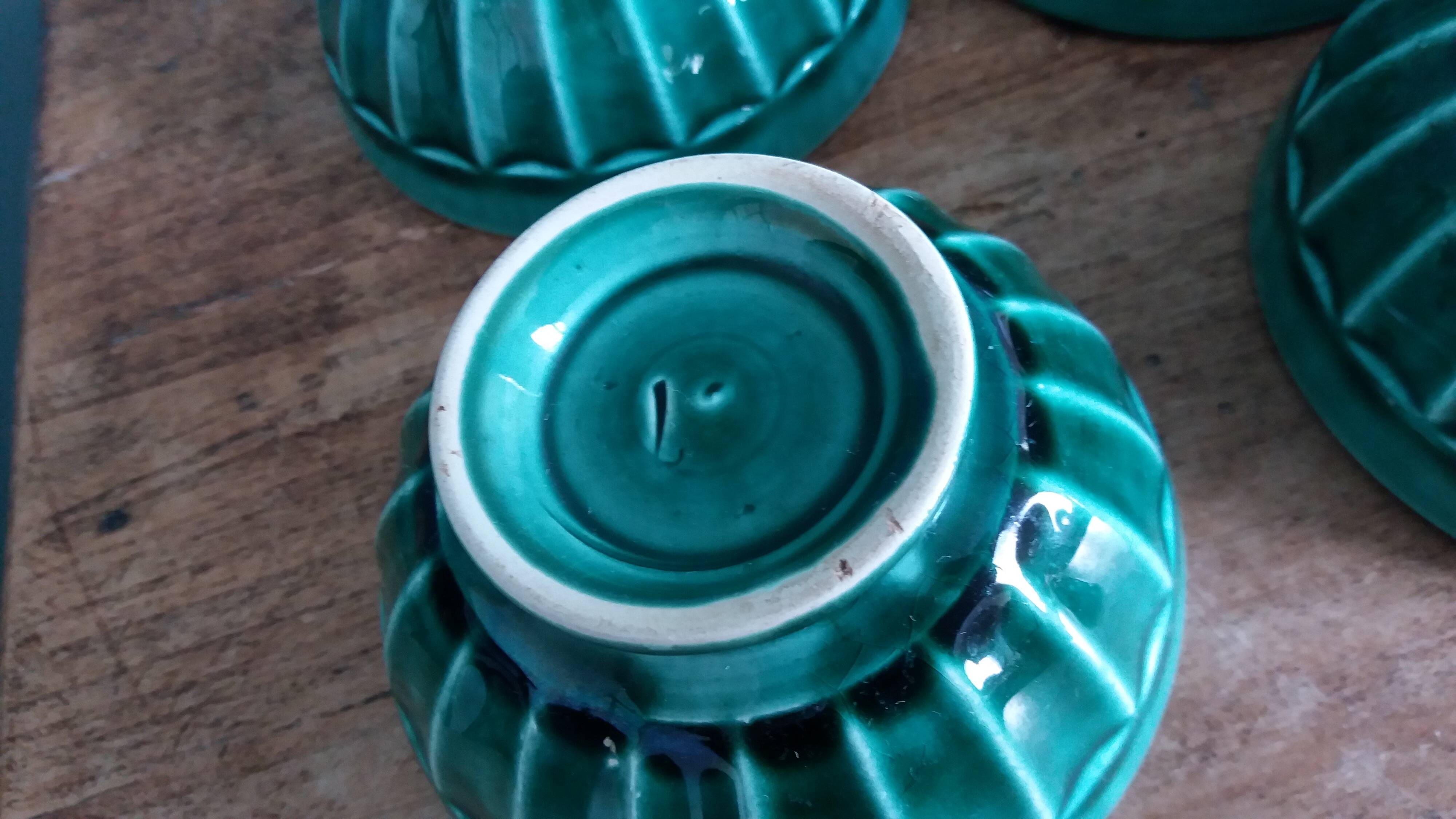 Emerald green glazed ceramic ribbed bowls