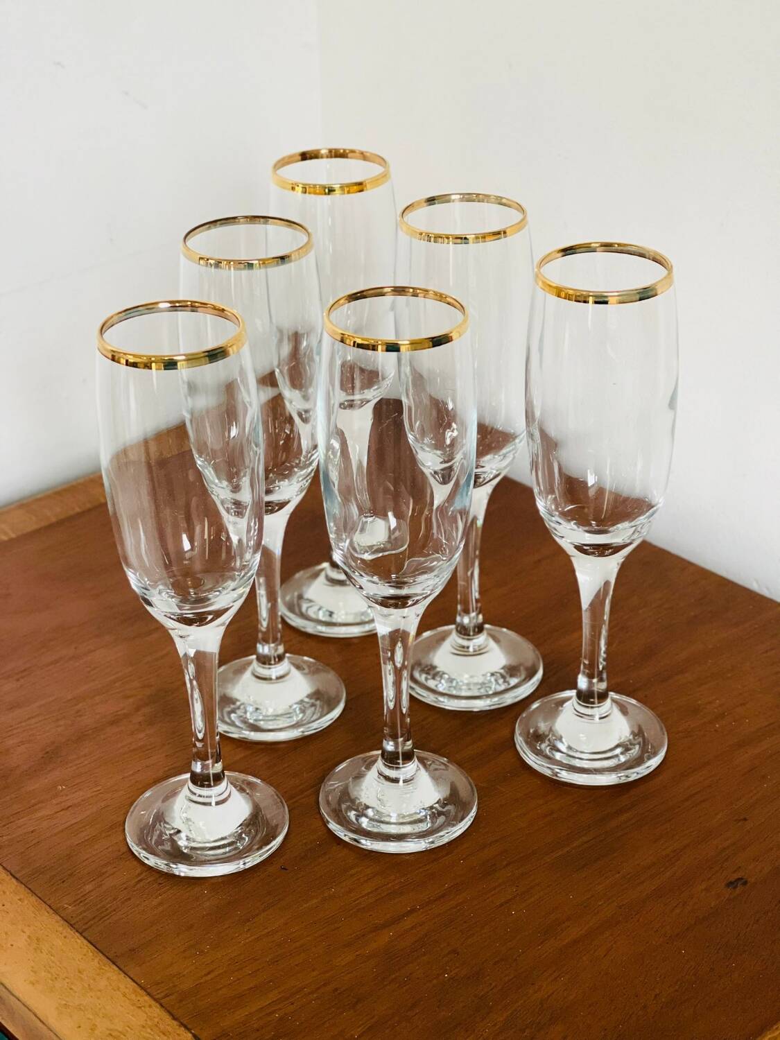 Gold rimmed champagne flutes