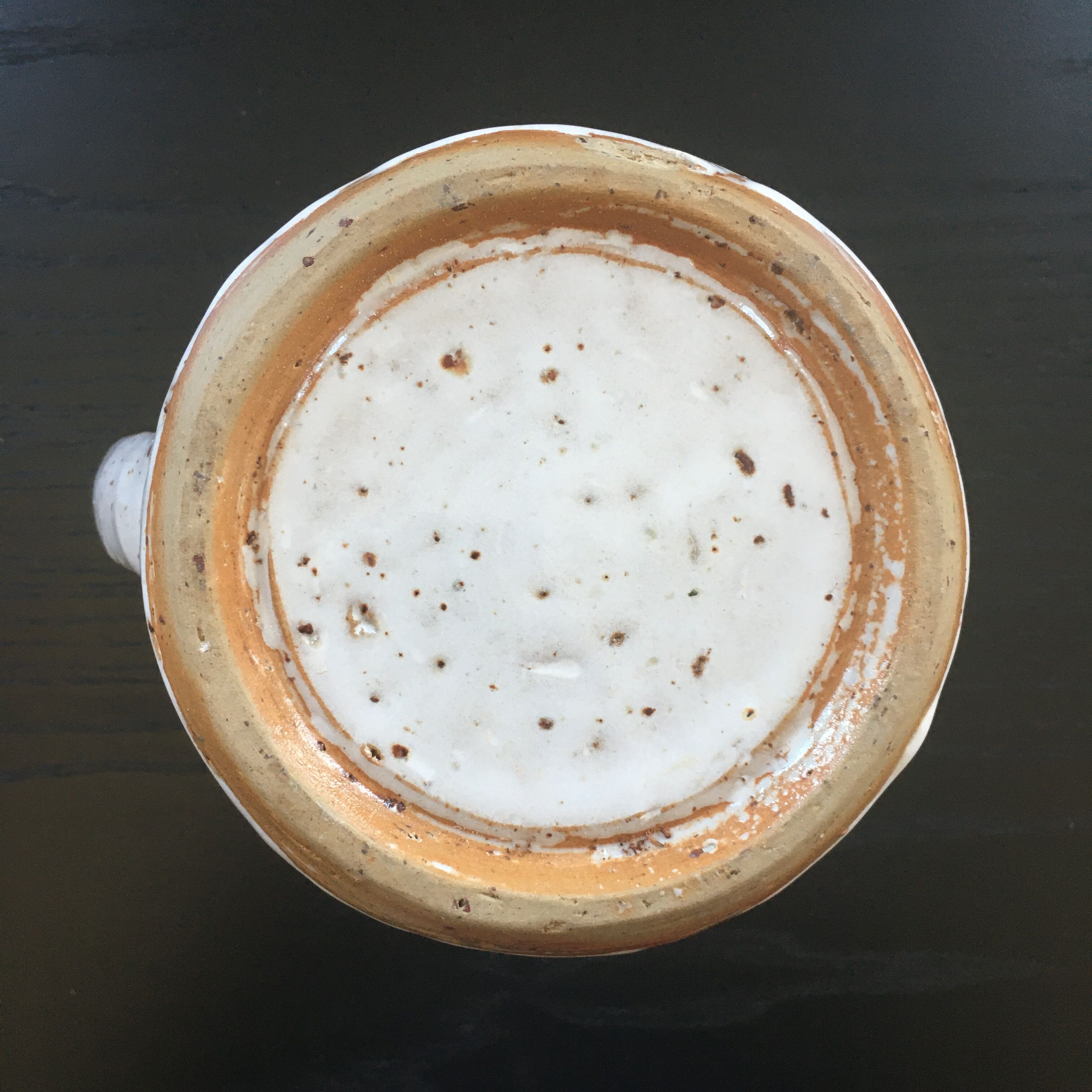 Old ivory stoneware jug