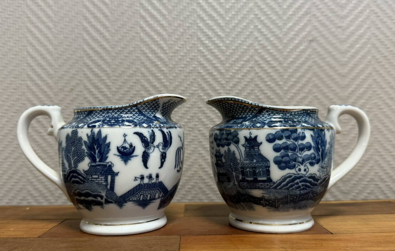 pair of English porcelain jugs with Asian decorations