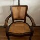 Ancien fauteuil de barbier / coiffeur en cannage