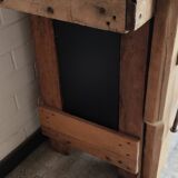 Old workbench furniture with six drawers and a door