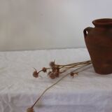 Old little terracotta jar