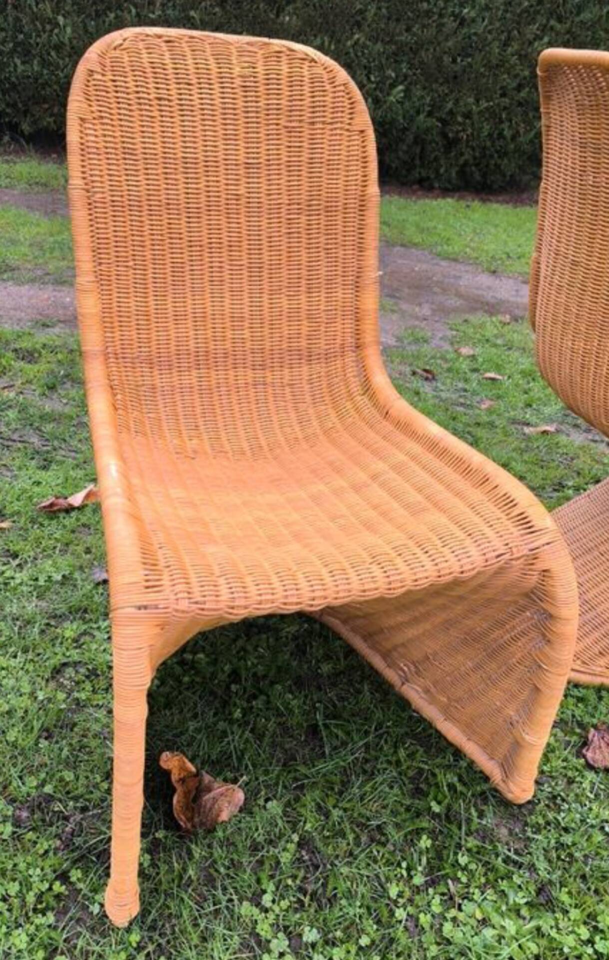 Pair of rattan chairs in the style of Verner Panton