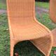 Pair of rattan chairs in the style of Verner Panton