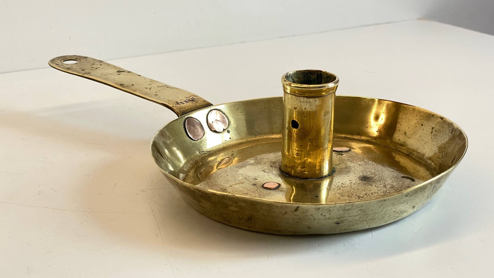 LOW HAND BRASS CANDLESTICK ANTIQUE