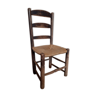 Old wooden chair and straw
