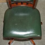 Modern captain's chair in leather, beech frame, adjustable.