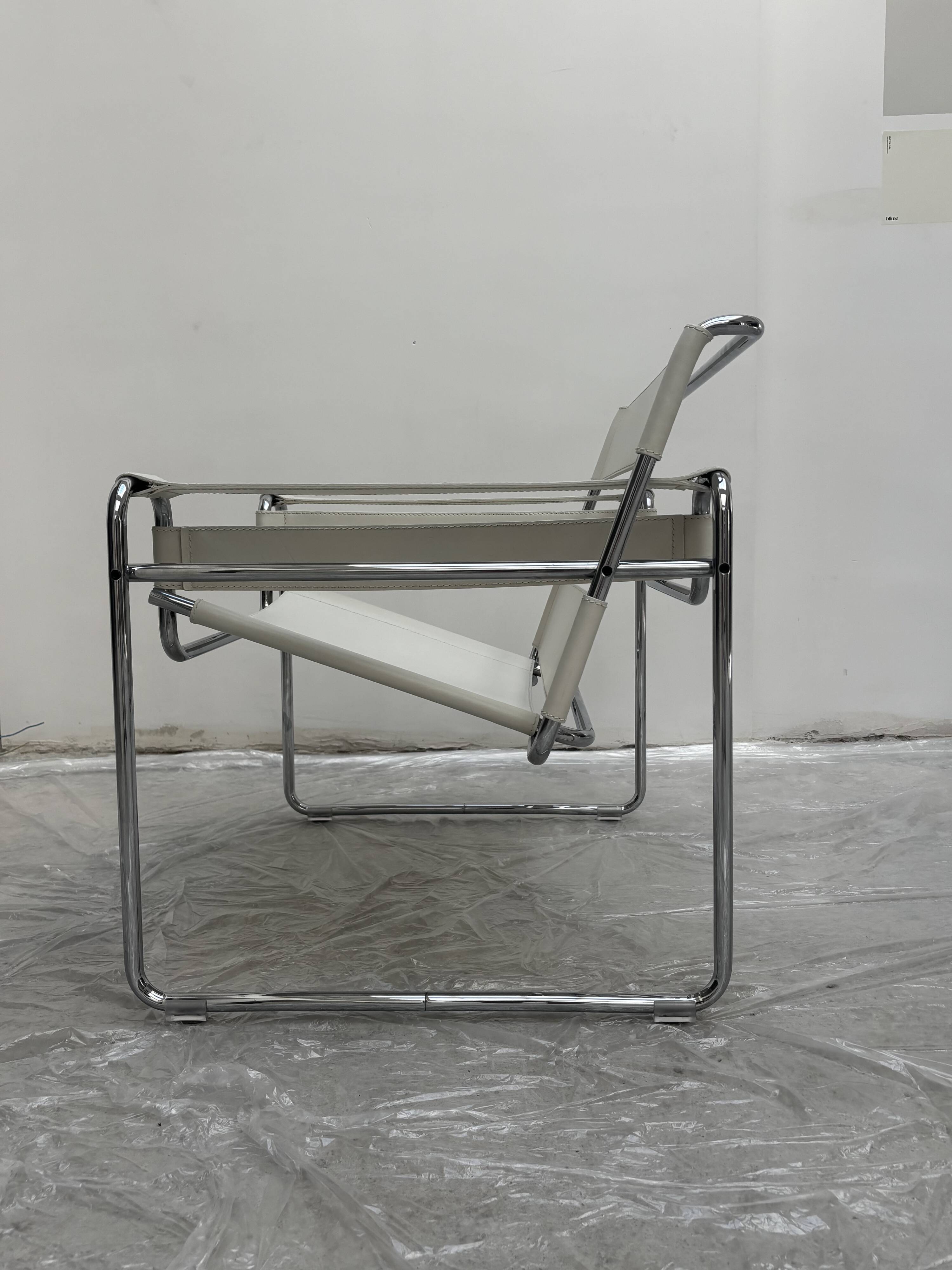 "Wassily" armchair by Marcel Breuer for Gavina in white leather.