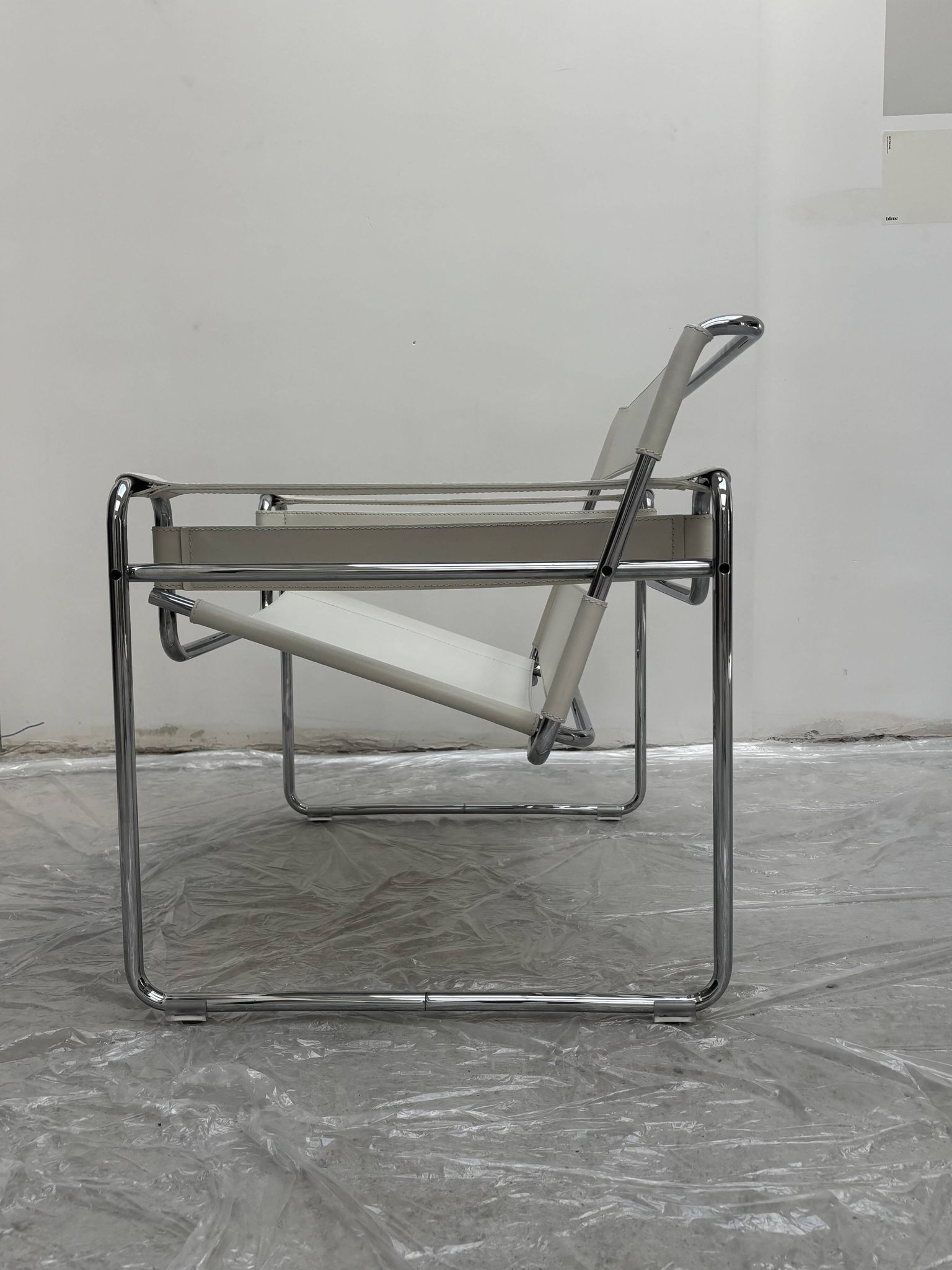 "Wassily" armchair by Marcel Breuer for Gavina in white leather.