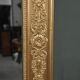 Important miroir en bois doré, style Restauration – Milieu XIXe