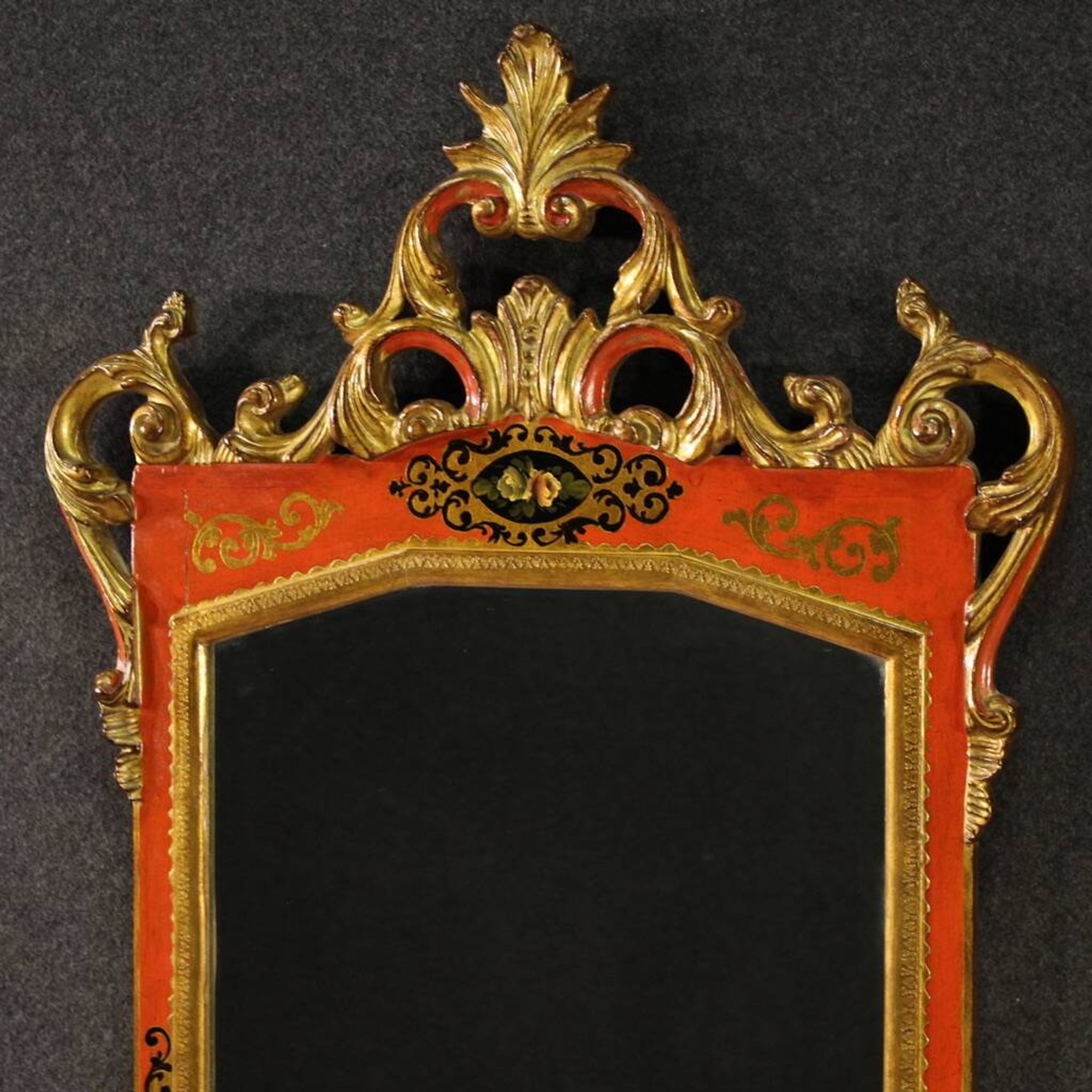 Miroir toscan laqué et doré du XXe siècle