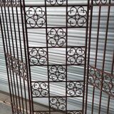 Screen partition wall made of glass and wrought iron