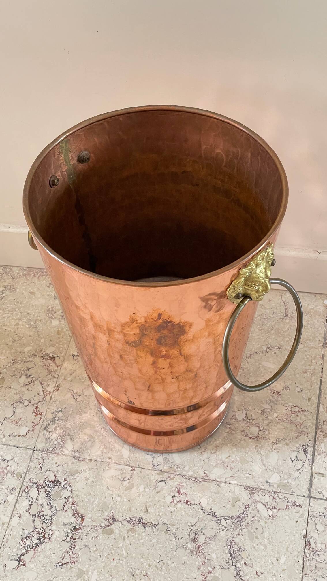 Vintage copper lion's head umbrella holder