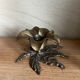 Brass flower candle holder