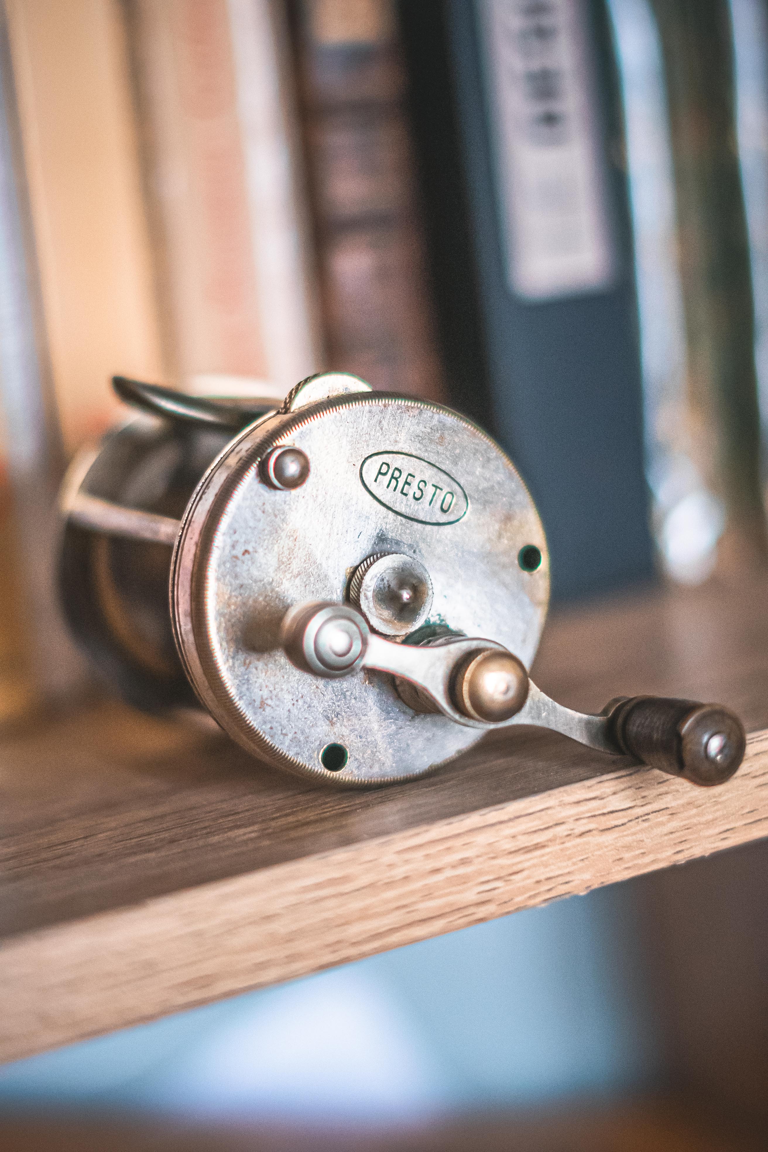 Old little fishing rod reel presto with bone handle fisherman collection