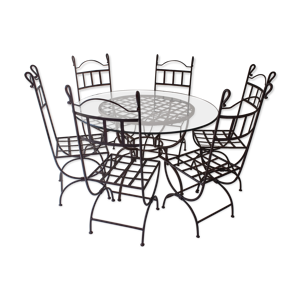 Table ronde structure en métal et plateau en verre et ses six chaises