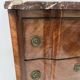 Transitional style chest of drawers in rosewood and amaranth veneer, 20th century.