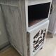 Two solid wood bedside tables with calfskin decoration.