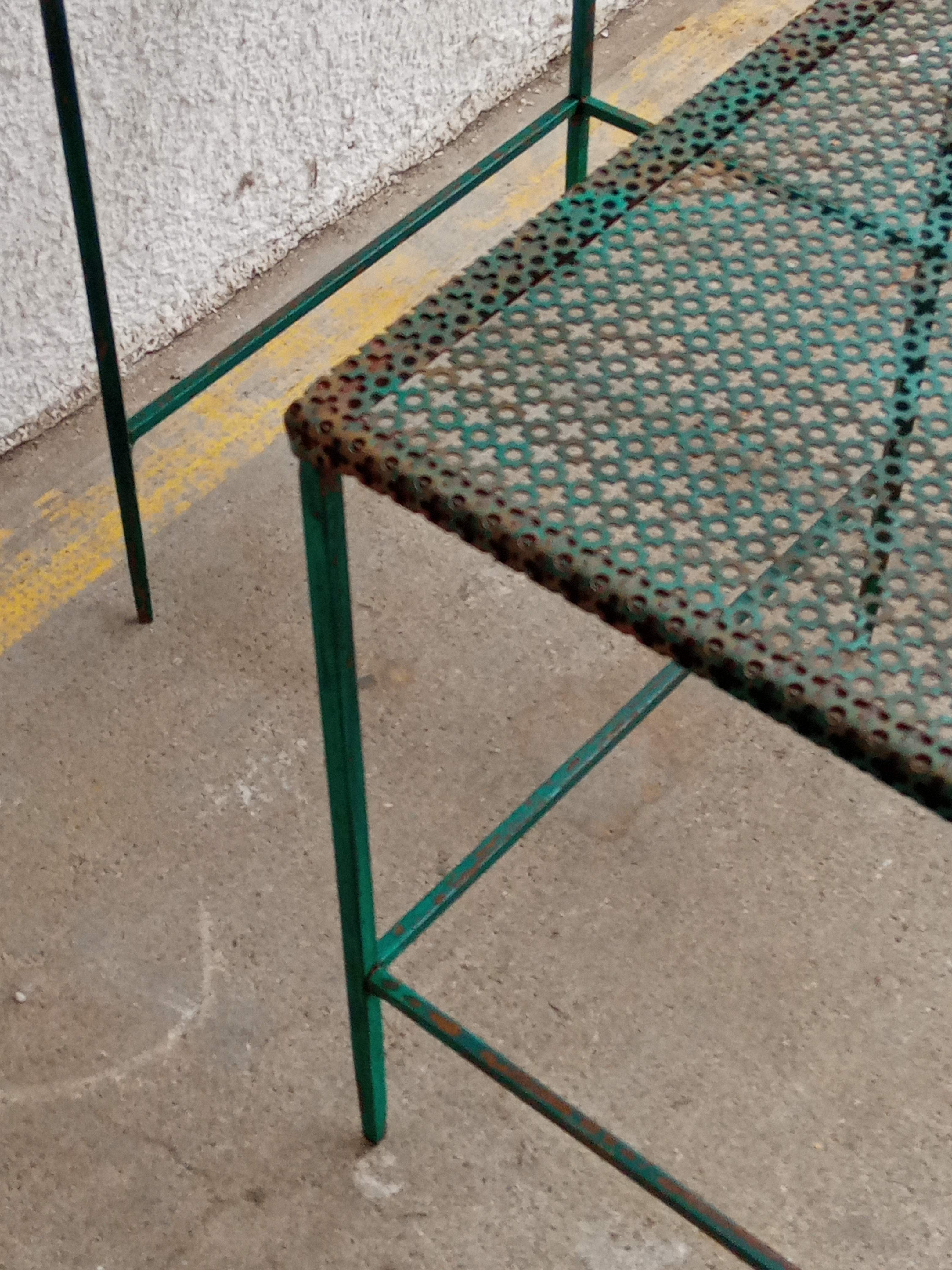 Triangular coffee table in perforated metal Mathieu Mategot