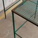 Triangular coffee table in perforated metal Mathieu Mategot