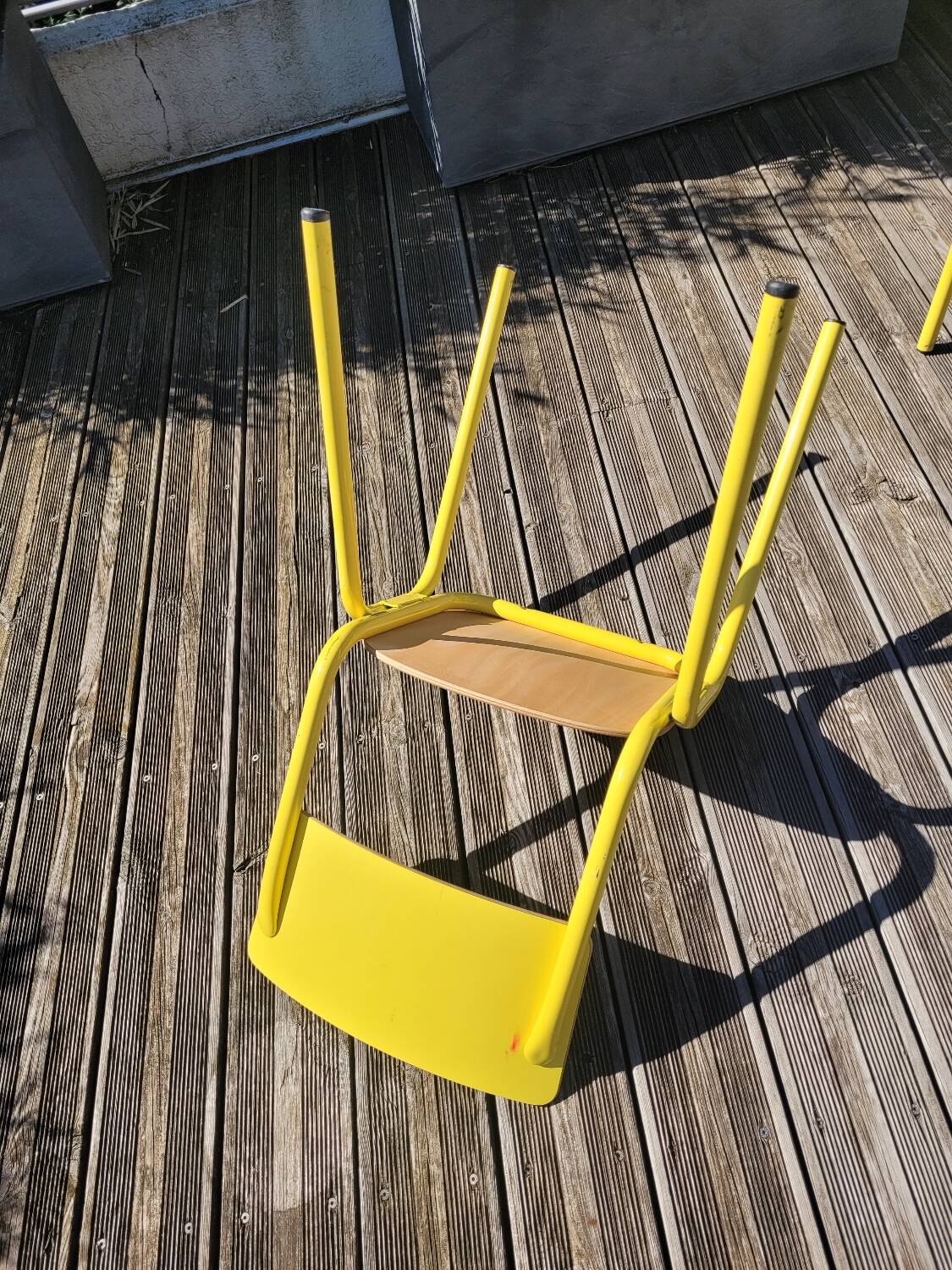 Pair of yellow plywood chairs