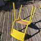 Pair of yellow plywood chairs