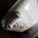 Antique soup tureen, white earthenware, with stopper decoration.