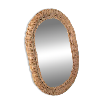 Vintage 70s bohemian wall mirror in woven rattan.