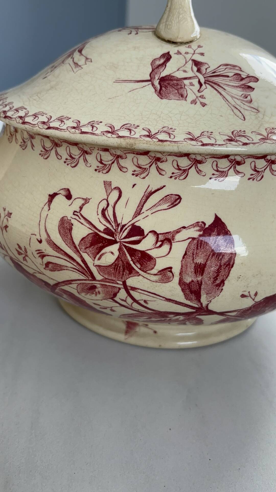Red earthenware soup tureen, Gien factory, honeysuckle model.