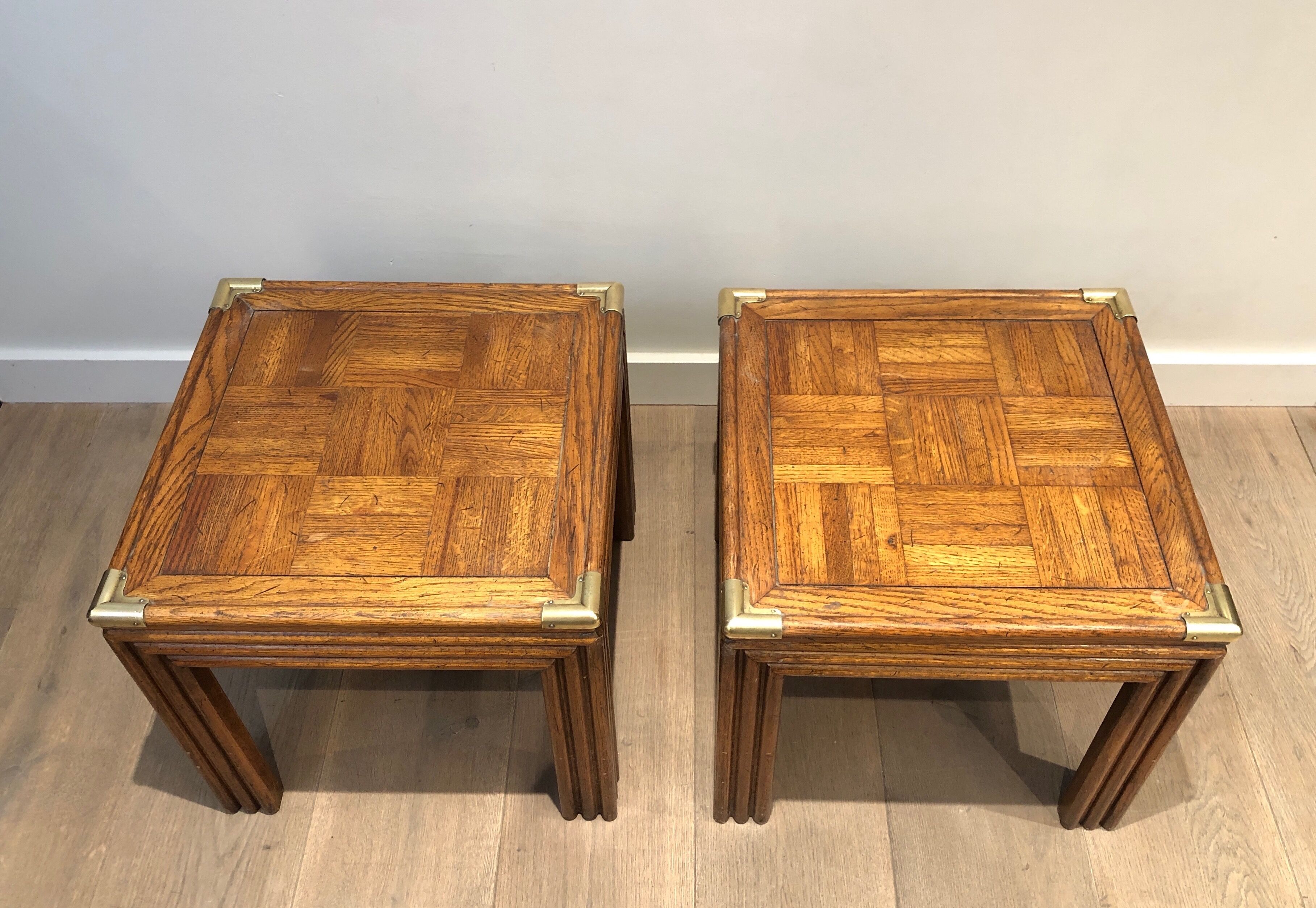 Pair of wooden and brass sofa ends
