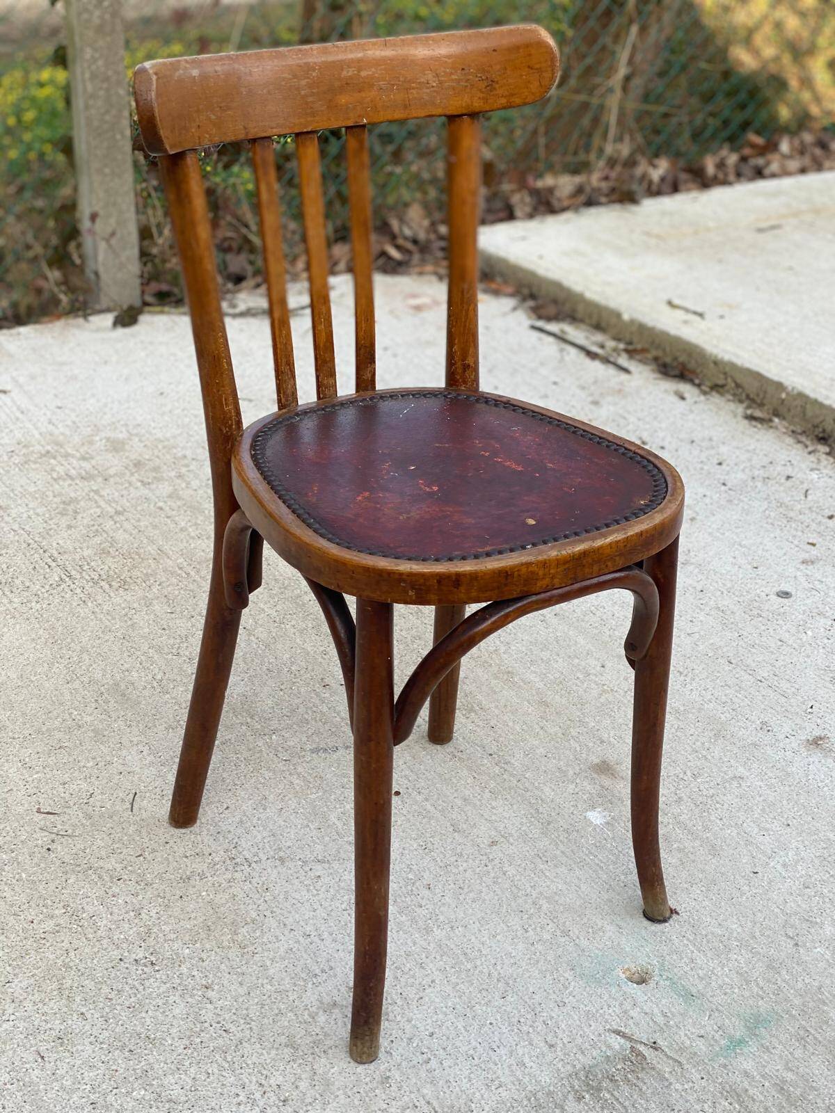 Bentwood bistro chair upholstered in burgundy leather