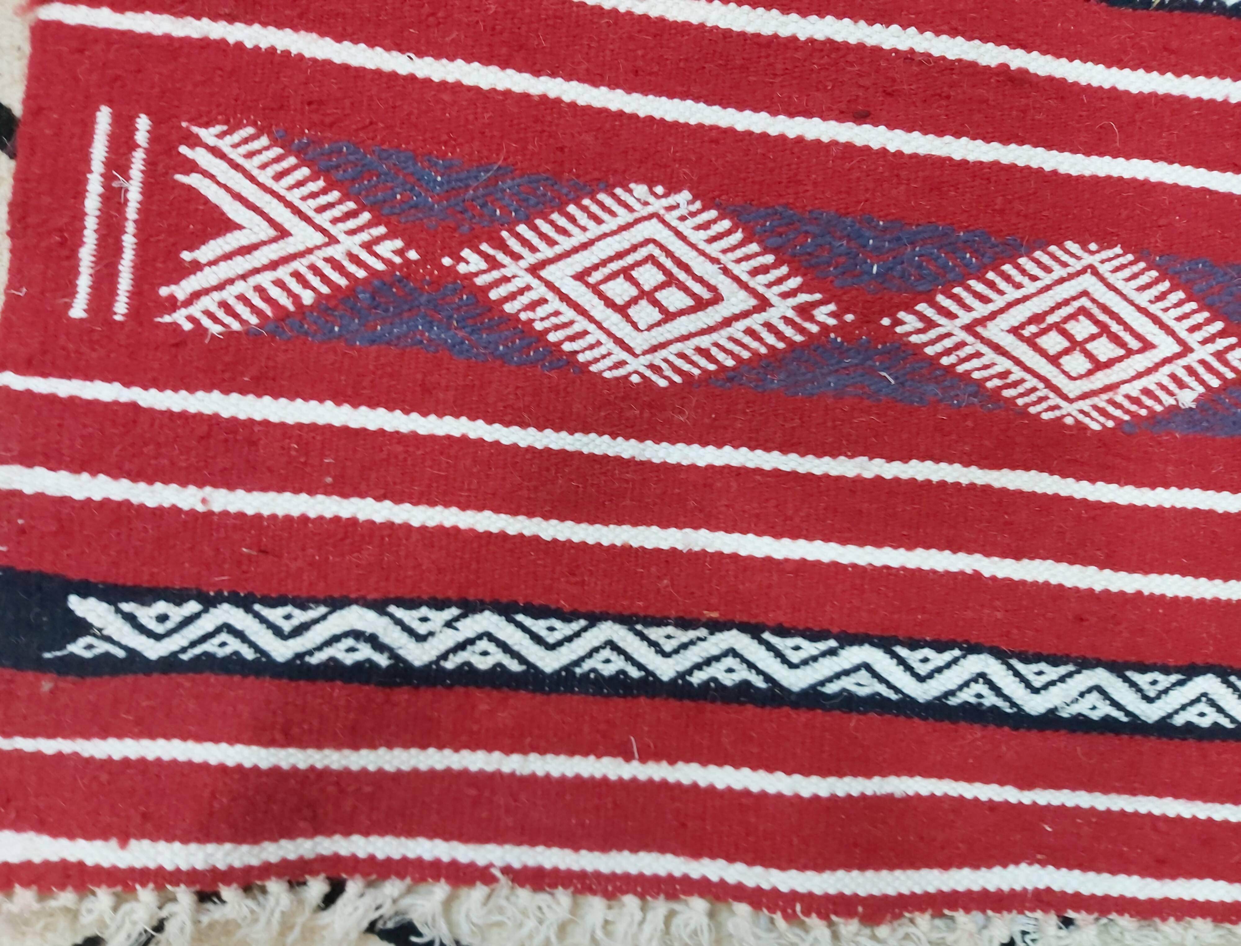 Traditional red kilim carpet