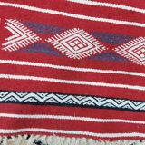 Traditional red kilim carpet