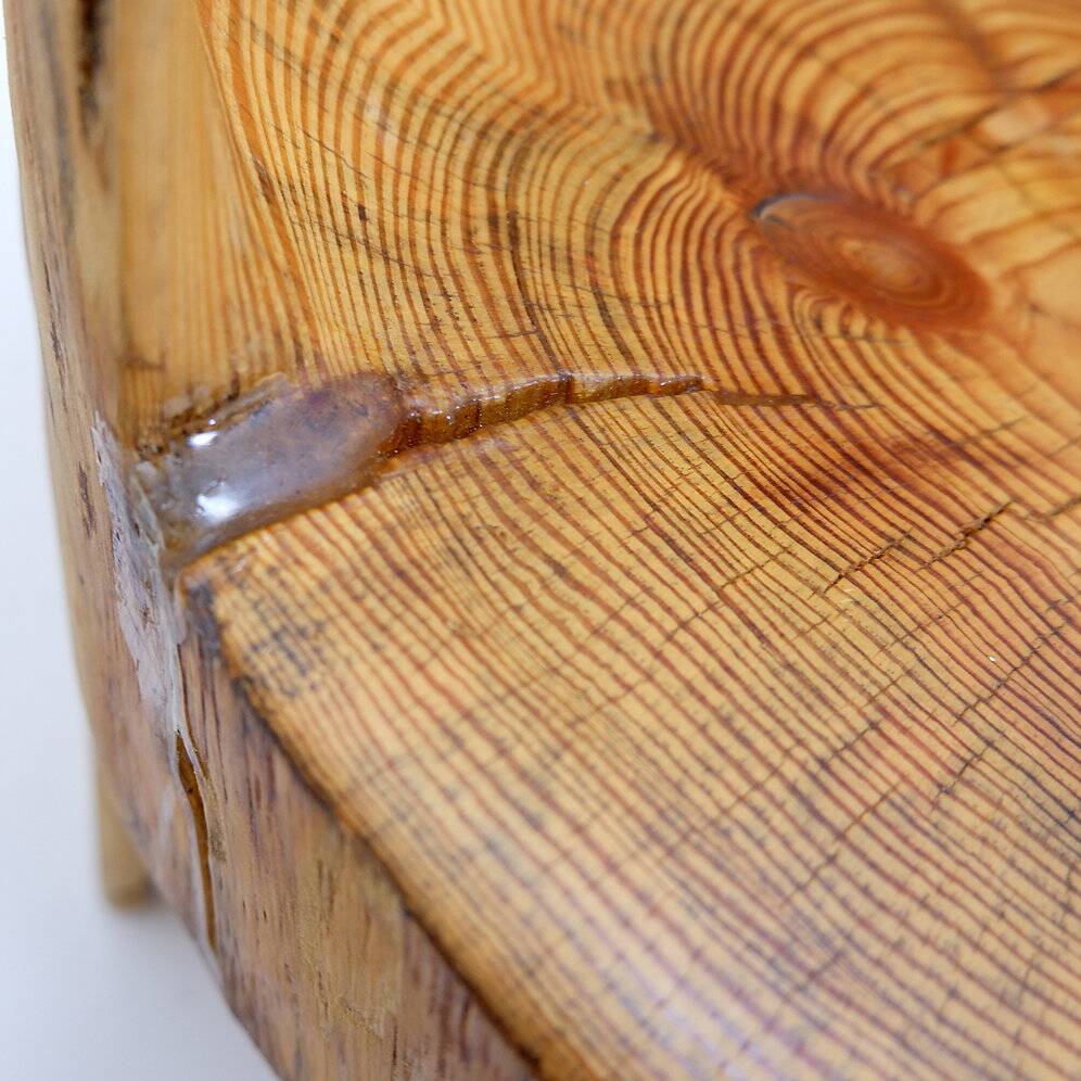 Brutalist sculptural chair in solid oak in wabi-sabi style.