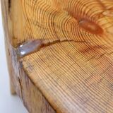 Brutalist sculptural chair in solid oak in wabi-sabi style.