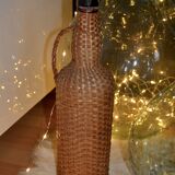 Braided rattan/wicker bottle