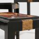 Set of three nesting tables with Asian decor, blackened wood, circa 1920.