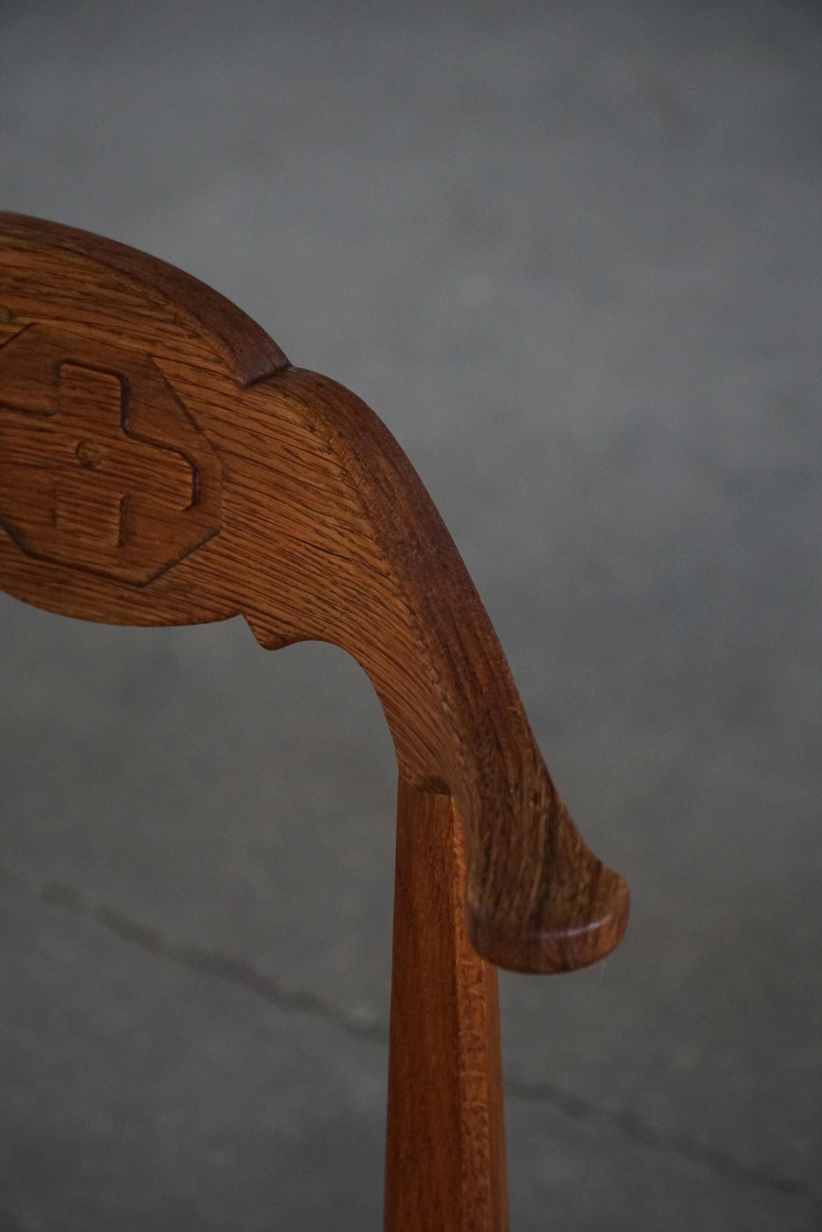 Henning Kjærnulf, set of 8 oak chairs with jute fabric, mid-century Danish, 1960s.